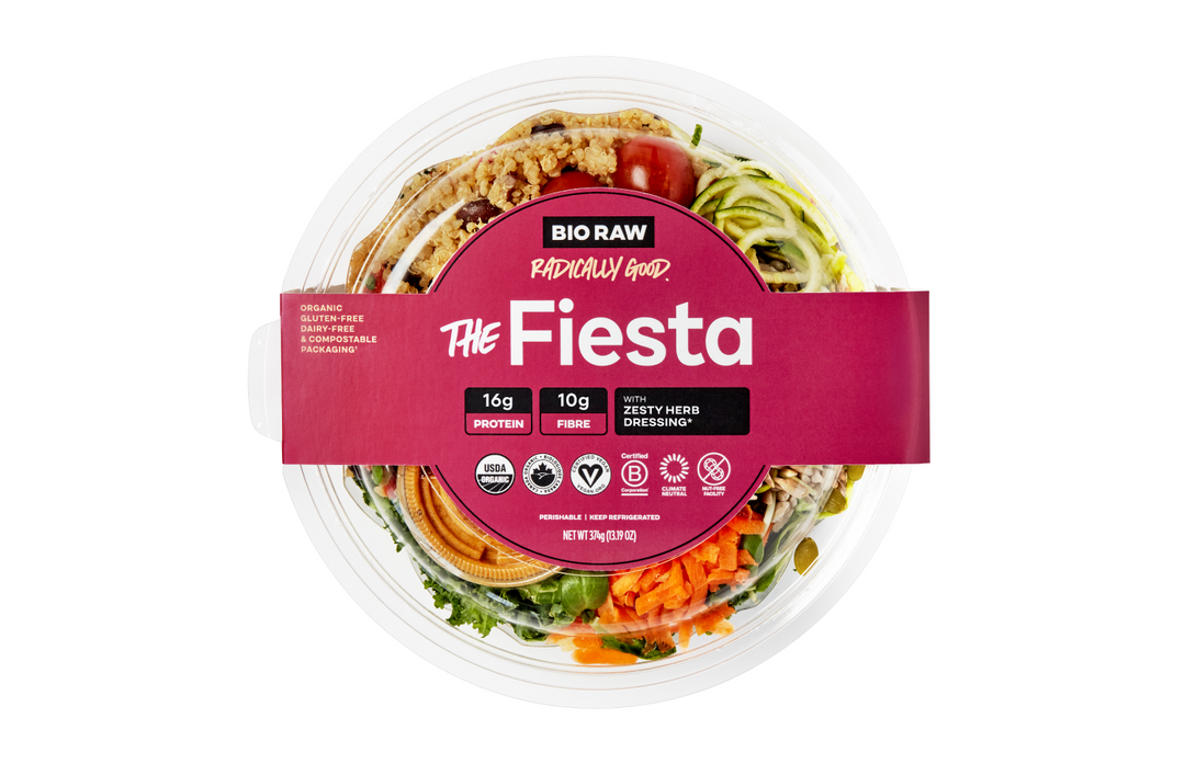 Packaged organic salad called 'The Fiesta' with a clear view of the ingredients and nutritional labels.